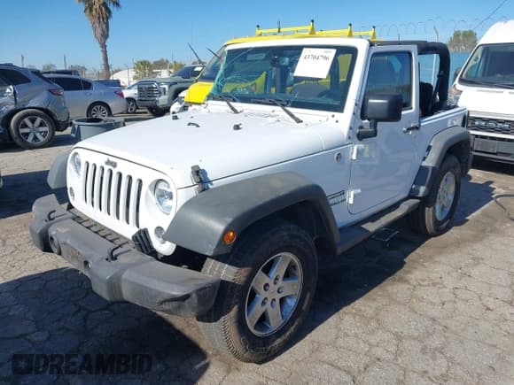 ✅ 2015 Jeep Wrangler Willys Wheeler • VIN: 1C4AJWAG1FL636417 • Lot: 43704796. Listed on IAAI with 81,914 mi. Free auction sales archive from the USA and detailed vehicle history report at DreamBid. Image 2.
