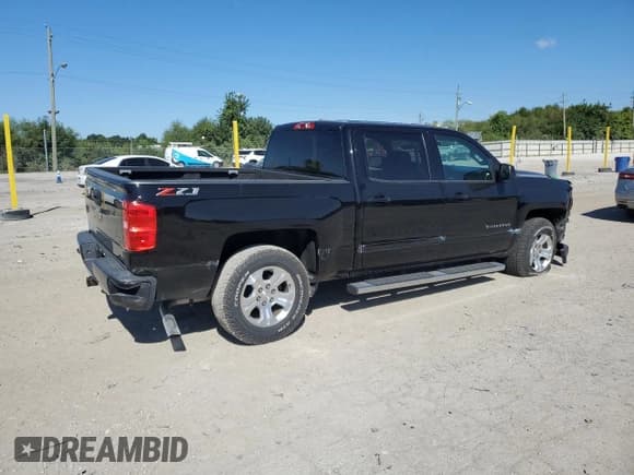 ✅ 2018 Chevrolet Silverado 1500 LT • VIN: 3GCUKREC9JG319915 • Лот: 69978685. Опубликован ранее на Copart с пробегом 155 717 миль. Бесплатный доступ к архиву аукционных продаж из США и подробный отчёт об истории автомобиля на DreamBid. Изображение 3.