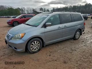 ✅ 2010 Honda Odyssey EX-L • VIN: 5FNRL3H60AB029980 • Лот: 93357365. Опубликован ранее на Copart с пробегом 122 617 миль. Бесплатный доступ к архиву аукционных продаж из США и подробный отчёт об истории автомобиля на DreamBid. Изображение 1.