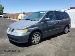 ✅ 2003 Honda Odyssey EX-L • VIN: 5FNRL18053B035938 • Lot: 66223485. Wystawiony na Copart z przebiegiem 187 462 mil. Bezpłatny archiwum sprzedaży aukcyjnych z USA i szczegółowy raport historii pojazdu na DreamBid. Zdjęcie 1.