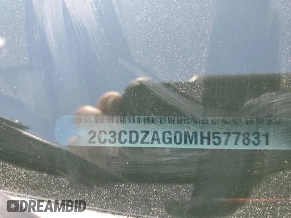 ✅ 2021 Dodge Challenger SXT • VIN: 2C3CDZAG0MH577831 • Lot: 59969883. Wystawiony na Copart z przebiegiem 42 989 mil. Bezpłatny archiwum sprzedaży aukcyjnych z USA i szczegółowy raport historii pojazdu na DreamBid. Zdjęcie 12.