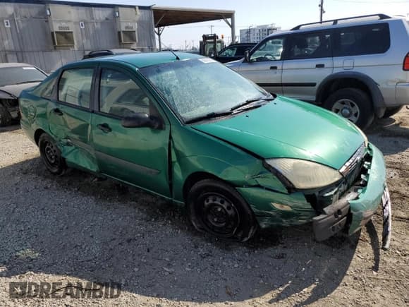 ✅ 2002 Ford Focus LX • VIN: 1FAFP33P12W116894 • Lot: 60923905. Wystawiony na Copart z przebiegiem 199 465 mil. Bezpłatny archiwum sprzedaży aukcyjnych z USA i szczegółowy raport historii pojazdu na DreamBid. Zdjęcie 4.