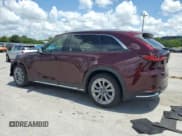 ✅ 2024 Mazda CX-90 Premium • VIN: JM3KKDHD4R1180258 • Лот: 66557455. Опубликован ранее на Copart с пробегом 25 261 миль. Бесплатный доступ к архиву аукционных продаж из США и подробный отчёт об истории автомобиля на DreamBid. Изображение 2.
