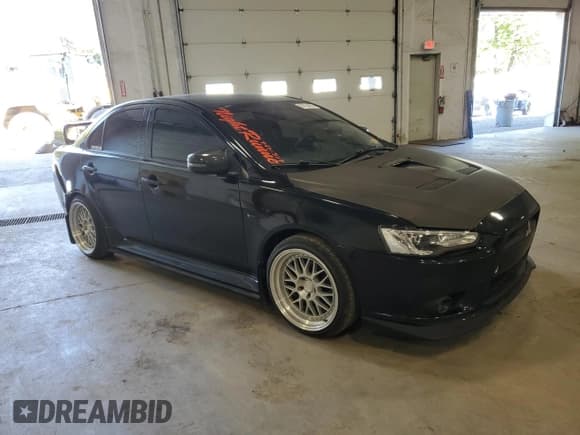 ✅ 2015 Mitsubishi Lancer SE • VIN: JA32V2FW0FU024185 • Lot: 84764505. Listed on Copart with 129,717 mi. Free auction sales archive from the USA and detailed vehicle history report at DreamBid. Image 4.