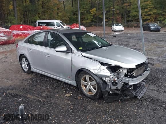 ✅ 2016 Chevrolet Cruze LT • VIN: 1G1PE5SB7G7199053 • Lot: 43536210. Listed on IAAI with 104,785 mi. Free auction sales archive from the USA and detailed vehicle history report at DreamBid. Image 1.