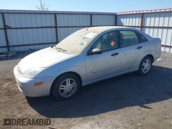 ✅ 2002 Ford Focus SE • VIN: 1FAFP34P42W212050 • Lot: 42152693. Listed on IAAI with 116,350 mi. Free auction sales archive from the USA and detailed vehicle history report at DreamBid. Image 2.