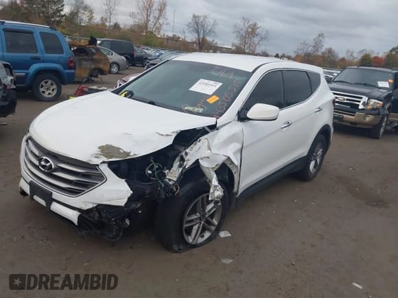 ✅ 2018 Hyundai Santa Fe 2.4L • VIN: 5NMZT3LB1JH057936 • Лот: 43505515. Опубликован ранее на IAAI с пробегом 152 899 миль. Бесплатный доступ к архиву аукционных продаж из США и подробный отчёт об истории автомобиля на DreamBid. Изображение 2.
