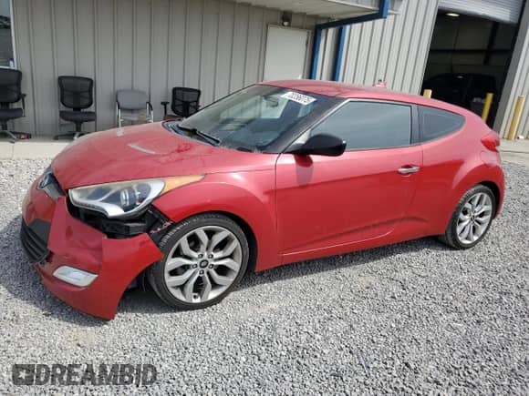 2014 Hyundai Veloster с VIN KMHTC6AD3EU214615, выставлен на аукционе Copart как лот 70256075 с пробегом 74 207 миль миль и Списание • Salvage title. История ставок и продаж доступна на DreamBid. Изображение 1.
