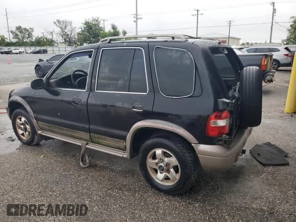 ✅ 2002 Kia Sportage • VIN: KNDJB723225136909 • Lot: 72007115. Listed on Copart with 107,720 mi. Free auction sales archive from the USA and detailed vehicle history report at DreamBid. Image 2.