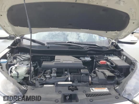 ✅ 2017 Honda CR-V Touring • VIN: 2HKRW2H93HH650606 • Лот: 82220585. Опубликован ранее на Copart с пробегом 34 827 миль. Бесплатный доступ к архиву аукционных продаж из США и подробный отчёт об истории автомобиля на DreamBid. Изображение 12.