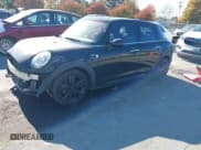 ✅ 2015 MINI Hardtop 4 Door • VIN: WMWXS5C59FT830719 • Lot: 43610367. Listed on IAAI with 90,169 mi. Free auction sales archive from the USA and detailed vehicle history report at DreamBid. Image 18.