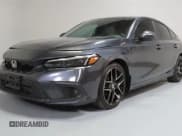 ✅ 2022 Honda Civic Sport Touring • VIN: 19XFL1H84NE001197 • Лот: 92100425. Опубликован ранее на Copart с пробегом 49 232 миль. Бесплатный доступ к архиву аукционных продаж из США и подробный отчёт об истории автомобиля на DreamBid. Изображение 2.