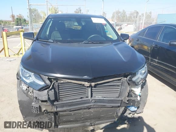 ✅ 2018 Chevrolet Equinox LT • VIN: 2GNAXJEVXJ6283534 • Lot: 43512156. Listed on IAAI with 105,451 mi. Free auction sales archive from the USA and detailed vehicle history report at DreamBid. Image 13.