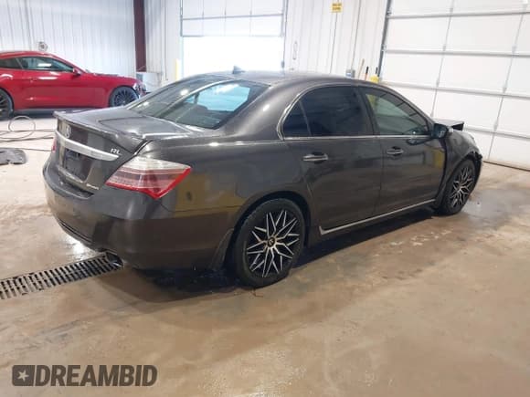✅ 2011 Acura RL Technology • VIN: JH4KB2F69BC000265 • Lot: 41516753. Listed on IAAI with 133,381 mi. Free auction sales archive from the USA and detailed vehicle history report at DreamBid. Image 4.