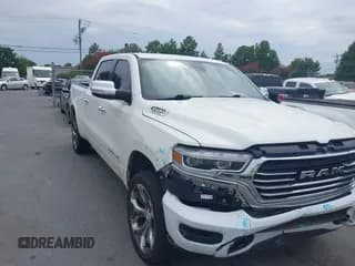 ✅ 2020 Ram 1500 Longhorn • VIN: 1C6SRFST8LN137579 • Lot: 42839039. Listed on IAAI with 129,013 mi. Free auction sales archive from the USA and detailed vehicle history report at DreamBid. Image 1.
