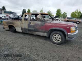 1995 Dodge Dakota z VIN 1B7GL23X6SS144198, wystawiony jako Copart lot #57501855 z przebiegiem Nie podano mil oraz Szkoda całkowita • Salvage title. Historia ofert i sprzedaży dostępna na DreamBid. Obrazek 4.