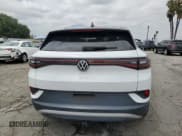 ✅ 2021 Volkswagen ID.4 1st Edition • VIN: WVGDMPE20MP022615 • Lot: 55896935. Listed on Copart with 30,472 mi. Free auction sales archive from the USA and detailed vehicle history report at DreamBid. Image 6.