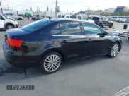 ✅ 2014 Volkswagen Jetta TDI w/Premium/Nav • VIN: 3VWLL7AJ3EM404934 • Lot: 42809693. Listed on IAAI with 142,331 mi. Free auction sales archive from the USA and detailed vehicle history report at DreamBid. Image 4.