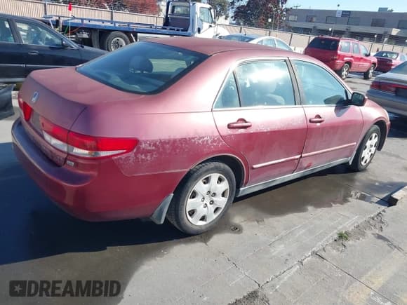 ✅ 2003 Honda Accord LX • VIN: 1HGCM66323A069293 • Lot: 43887603. Listed on IAAI with 241,965 mi. Free auction sales archive from the USA and detailed vehicle history report at DreamBid. Image 4.