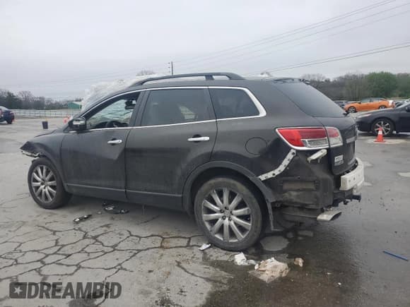 ✅ 2007 Mazda CX-9 Grand Touring • VIN: JM3TB28Y270108330 • Лот: 50896695. Опубликован ранее на Copart с пробегом Не указан. Бесплатный доступ к архиву аукционных продаж из США и подробный отчёт об истории автомобиля на DreamBid. Изображение 2.