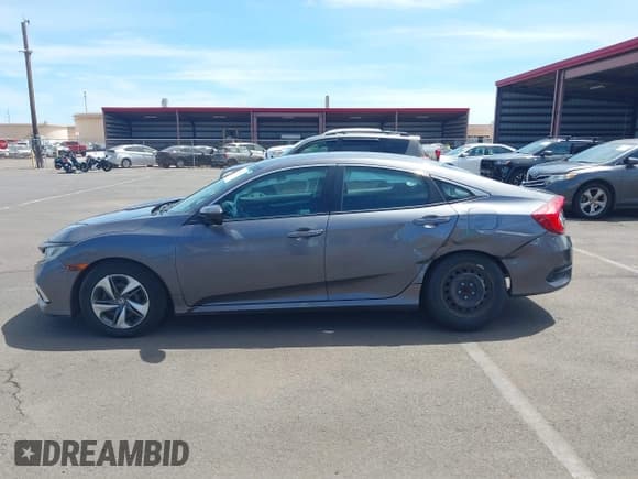 ✅ 2021 Honda Civic LX • VIN: 2HGFC2F66MH509733 • Lot: 43210031. Listed on IAAI with 65,634 mi. Free auction sales archive from the USA and detailed vehicle history report at DreamBid. Image 14.