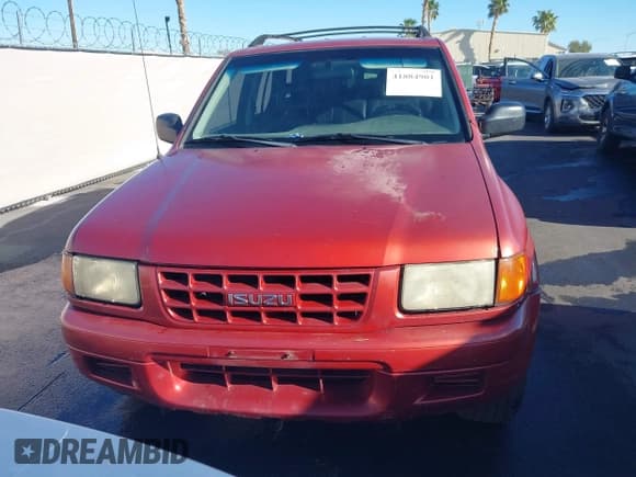 ✅ 1999 Isuzu Rodeo S • VIN: 4S2CK58W3X4307201 • Lot: 41884901. Listed on IAAI with 236,970 mi. Free auction sales archive from the USA and detailed vehicle history report at DreamBid. Image 6.