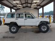 ✅ 1998 Jeep Cherokee Sport • VIN: 1J4FJ68S7WL169885 • Lot: 43792886. Listed on IAAI with 201,014 mi. Free auction sales archive from the USA and detailed vehicle history report at DreamBid. Image 14.