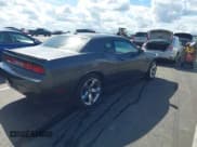 ✅ 2013 Dodge Challenger SXT • VIN: 2C3CDYAG0DH684162 • Lot: 43399757. Listed on IAAI with 113,941 mi. Free auction sales archive from the USA and detailed vehicle history report at DreamBid. Image 4.