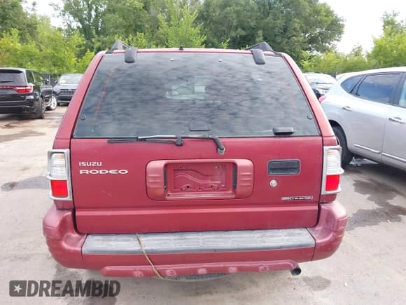 ✅ 2004 Isuzu Rodeo S • VIN: 4S2CK58Y444303591 • Lot: 42707772. Listed on IAAI with 156,792 mi. Free auction sales archive from the USA and detailed vehicle history report at DreamBid. Image 17.