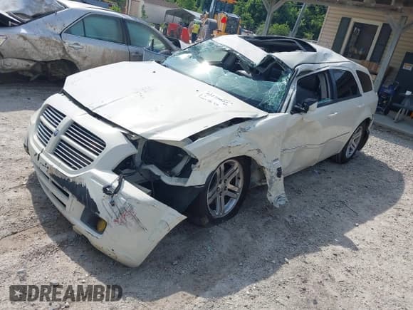 ✅ 2005 Dodge Magnum RT • VIN: 2D4GV58265H610798 • Lot: 42275022. Listed on IAAI with 112,832 mi. Free auction sales archive from the USA and detailed vehicle history report at DreamBid. Image 2.