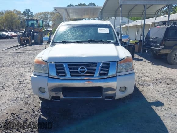 ✅ 2011 Nissan Titan SL • VIN: 1N6BA0ED0BN322450 • Lot: 41885929. Listed on IAAI with 340,922 mi. Free auction sales archive from the USA and detailed vehicle history report at DreamBid. Image 12.