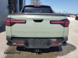 2022 Hyundai Santa Cruz SEL z VIN 5NTJB4AE1NH007406, wystawiony jako Copart lot #75457224 z przebiegiem 23 725 mil mil oraz Szkoda całkowita • Salvage title. Historia ofert i sprzedaży dostępna na DreamBid. Obrazek 6.