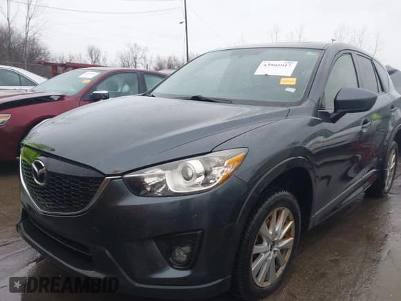 ✅ 2013 Mazda CX-5 Touring • VIN: JM3KE4CE7D0111473 • Lot: 43905917. Listed on IAAI with 222,787 mi. Free auction sales archive from the USA and detailed vehicle history report at DreamBid. Image 2.