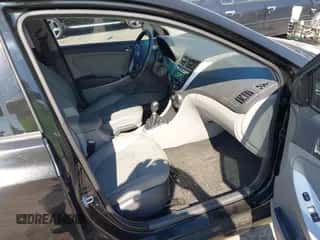 2012 Hyundai Accent SE with VIN KMHCU5AE3CU021149, listed as a IAAI auction lot 43306791 with 123,259 mi miles and . Bid and sale history available at DreamBid. Image 5.