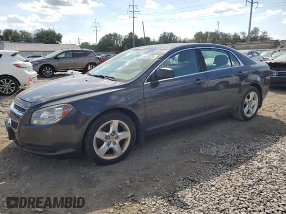 ✅ 2011 Chevrolet Malibu 1LS • VIN: 1G1ZB5E11BF203343 • Lot: 72412874. Listed on Copart with 121,674 mi. Free auction sales archive from the USA and detailed vehicle history report at DreamBid. Image 1.