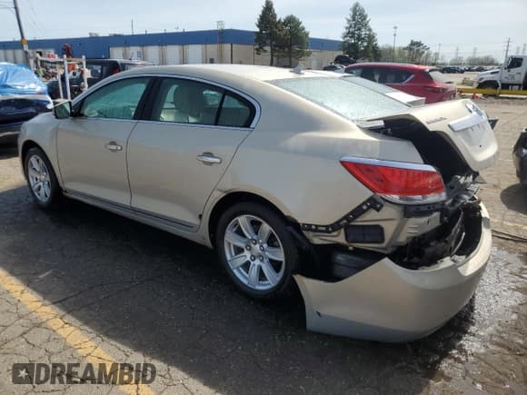 ✅ 2012 Buick LaCrosse Leather • VIN: 1G4GC5E30CF289979 • Лот: 54054655. Опубликован ранее на Copart с пробегом 80 265 миль. Бесплатный доступ к архиву аукционных продаж из США и подробный отчёт об истории автомобиля на DreamBid. Изображение 2.