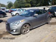 ✅ 2015 Hyundai Veloster Turbo • VIN: KMHTC6AE1FU229902 • Lot: 75295704. Wystawiony na Copart z przebiegiem 133 796 mil. Bezpłatny archiwum sprzedaży aukcyjnych z USA i szczegółowy raport historii pojazdu na DreamBid. Zdjęcie 1.