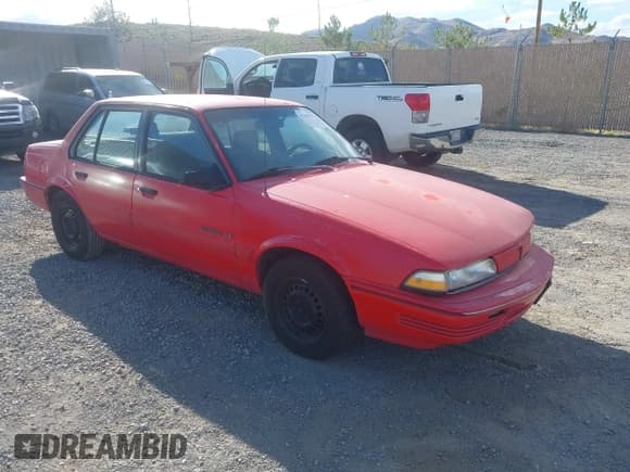 ✅ 1993 Pontiac Sunbird • VIN: 1G2JB54H5P7513942 • Lot: 43304962. Listed on IAAI with 126,707 mi. Free auction sales archive from the USA and detailed vehicle history report at DreamBid. Image 1.