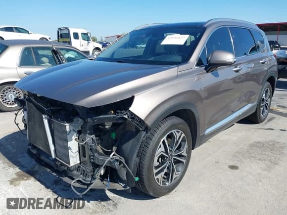✅ 2019 Hyundai Santa Fe Limited • VIN: 5NMS5CAA8KH036668 • Лот: 43544647. Опубликован ранее на IAAI с пробегом 82 738 миль. Бесплатный доступ к архиву аукционных продаж из США и подробный отчёт об истории автомобиля на DreamBid. Изображение 2.
