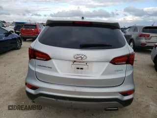 ✅ 2018 Hyundai Santa Fe 2.4L • VIN: 5XYZT3LB8JG531116 • Лот: 71703713. Опубликован ранее на Copart с пробегом 90 874 миль. Бесплатный доступ к архиву аукционных продаж из США и подробный отчёт об истории автомобиля на DreamBid. Изображение 6.