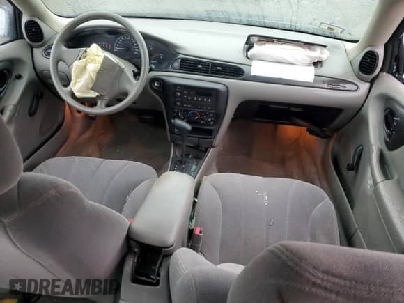 2003 Chevrolet Malibu z VIN 1G1ND52J13M660762, wystawiony jako Copart lot #85143664 z przebiegiem 73 630 mil mil oraz Szkoda całkowita • Salvage title. Historia ofert i sprzedaży dostępna na DreamBid. Obrazek 8.