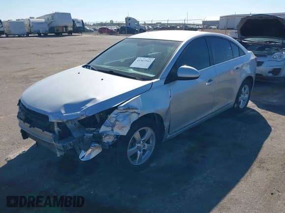 2016 Chevrolet Cruze LT z VIN 1G1PE5SB9G7194405, wystawiony jako IAAI lot #43367563 z przebiegiem 99 779 mil mil oraz . Historia ofert i sprzedaży dostępna na DreamBid. Obrazek 2.