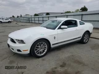✅ 2012 Ford Mustang Premium • VIN: 1ZVBP8AM5C5266493 • Lot: 80402285. Listed on Copart with 150,043 mi. Free auction sales archive from the USA and detailed vehicle history report at DreamBid. Image 1.