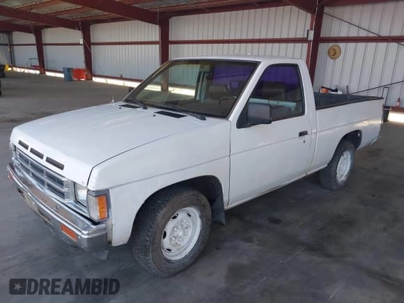 ✅ 1990 Nissan Frontier • VIN: 1N6SD11S2LC427683 • Lot: 42359094. Listed on IAAI with 172,624 mi. Free auction sales archive from the USA and detailed vehicle history report at DreamBid. Image 2.