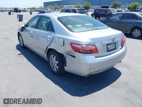 ✅ 2009 Toyota Camry LE • VIN: JTNBK46K893038974 • Lot: 42590939. Listed on IAAI with 214,794 mi. Free auction sales archive from the USA and detailed vehicle history report at DreamBid. Image 6.