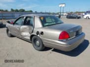 ✅ 2001 Ford Crown Victoria • VIN: 2FAFP73W01X131209 • Lot: 43033250. Listed on IAAI with 241,898 mi. Free auction sales archive from the USA and detailed vehicle history report at DreamBid. Image 3.