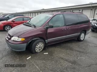 ✅ 1999 Dodge Caravan SE • VIN: 1B4GP44G7XB827272 • Lot: 90220115. Listed on Copart with 221,618 mi. Free auction sales archive from the USA and detailed vehicle history report at DreamBid. Image 1.