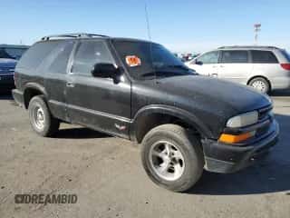 2000 Chevrolet Blazer LS z VIN 1GNCS18W9YK197621, wystawiony jako Copart lot #81809994 z przebiegiem 339 155 mil mil oraz Szkoda całkowita • Salvage title. Historia ofert i sprzedaży dostępna na DreamBid. Obrazek 4.