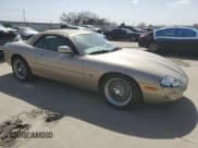 ✅ 1998 Jaguar XK • VIN: SAJGX2242WC027750 • Lot: 47766535. Listed on Copart with 113,161 mi. Free auction sales archive from the USA and detailed vehicle history report at DreamBid. Image 4.