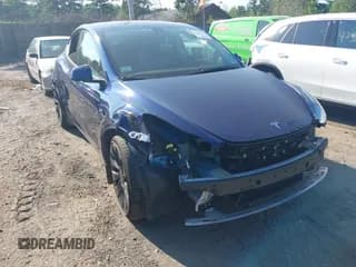 ✅ 2022 Tesla Model Y Performance • VIN: 7SAYGDEF4NF539414 • Lot: 42798058. Listed on IAAI with 34,554 mi. Free auction sales archive from the USA and detailed vehicle history report at DreamBid. Image 1.